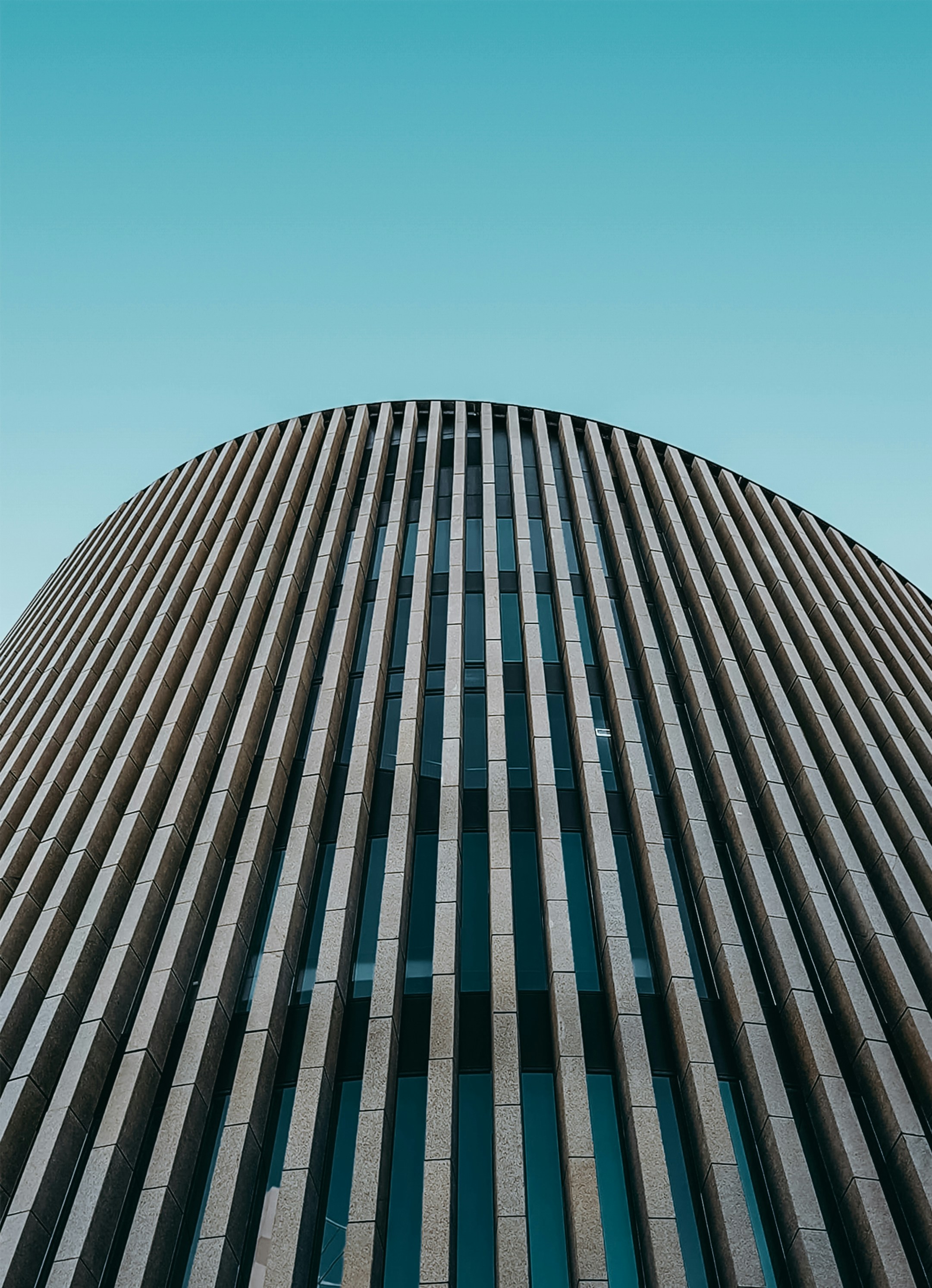 Image of a low-angle high-curtain shot of an office building.